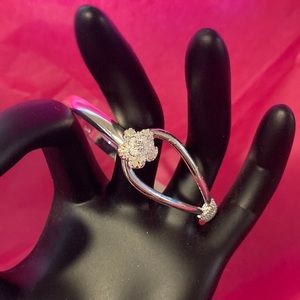 Sterling silver rose bangle bracelet.